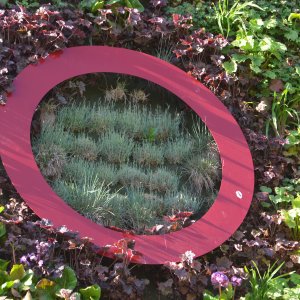 The "Green Wall" - this vertically greened system features automated irrigation .